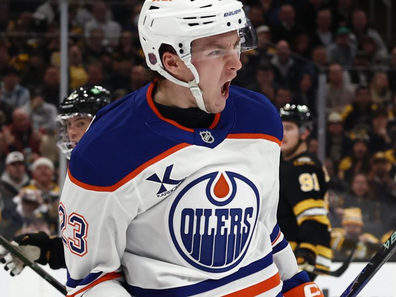 Dec 18, 2025; Boston, Massachusetts, USA; Edmonton Oilers right wing Quinn Hutson (23) celebrates his first NHL goal during the second period against the Boston Bruins at TD Garden. Mandatory Credit: Winslow Townson-Imagn Images