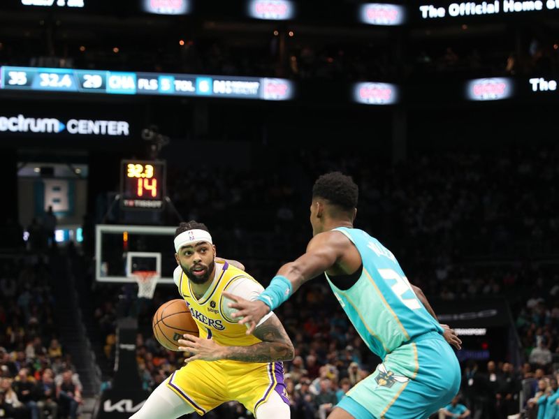 CHARLOTTE, NC - FEBRUARY 5: D'Angelo Russell #1 of the Los Angeles Lakers handles the ball during the game  against the Charlotte Hornets on February 5, 2024 at Spectrum Center in Charlotte, North Carolina. NOTE TO USER: User expressly acknowledges and agrees that, by downloading and or using this photograph, User is consenting to the terms and conditions of the Getty Images License Agreement.  Mandatory Copyright Notice:  Copyright 2024 NBAE (Photo by Brock Williams-Smith/NBAE via Getty Images)