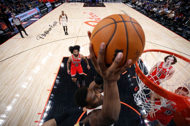 DETROIT, MI - NOVEMBER 18: Jalen Duren #0 of the Detroit Pistons dunks the ball during the game against the Chicago Bulls on November 18, 2024 at Little Caesars Arena in Detroit, Michigan. NOTE TO USER: User expressly acknowledges and agrees that, by downloading and/or using this photograph, User is consenting to the terms and conditions of the Getty Images License Agreement. Mandatory Copyright Notice: Copyright 2024 NBAE (Photo by Brian Sevald/NBAE via Getty Images)