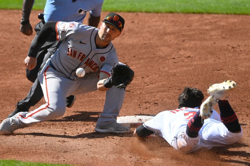 Jul 6, 2024; Cleveland, Ohio, USA; San Francisco Giants shortstop Nick Ahmed (16) catches the ball before tagging out Cleveland Guardians center fielder Tyler Freeman (2) in the third inning at Progressive Field. Mandatory Credit: David Richard-USA TODAY Sports