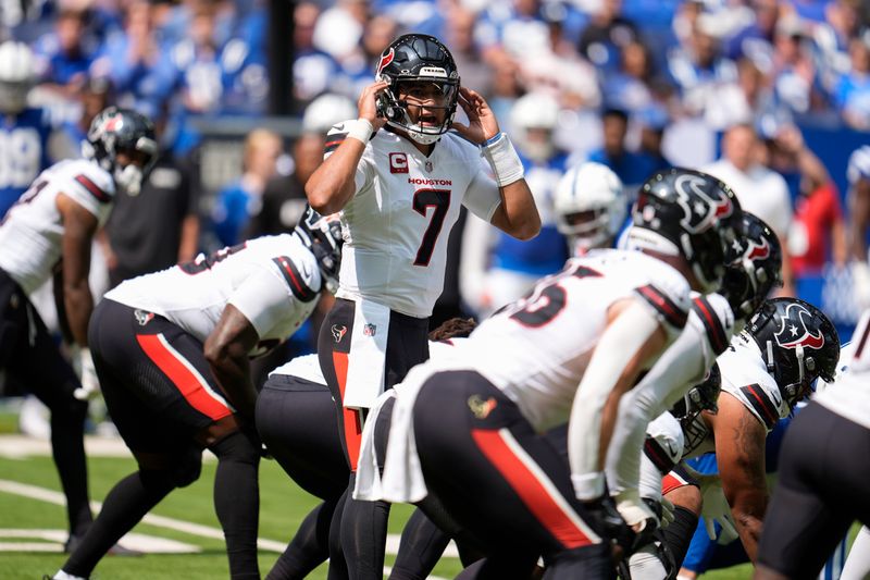 Houston Texans quarterback C.J. Stroud (7) calls a play during the first half of an NFL football game against the Indianapolis Colts, Sunday, Sept. 8, 2024, in Indianapolis. (AP Photo/Michael Conroy)
