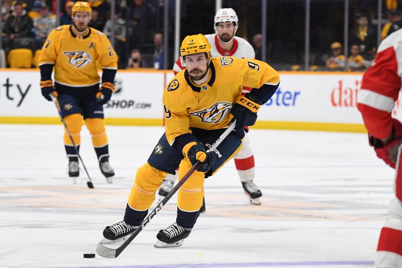 Mar 23, 2024; Nashville, Tennessee, USA; Nashville Predators left wing Filip Forsberg (9) skates with the puck during the first period against the Detroit Red Wings at Bridgestone Arena. Mandatory Credit: Christopher Hanewinckel-USA TODAY Sports