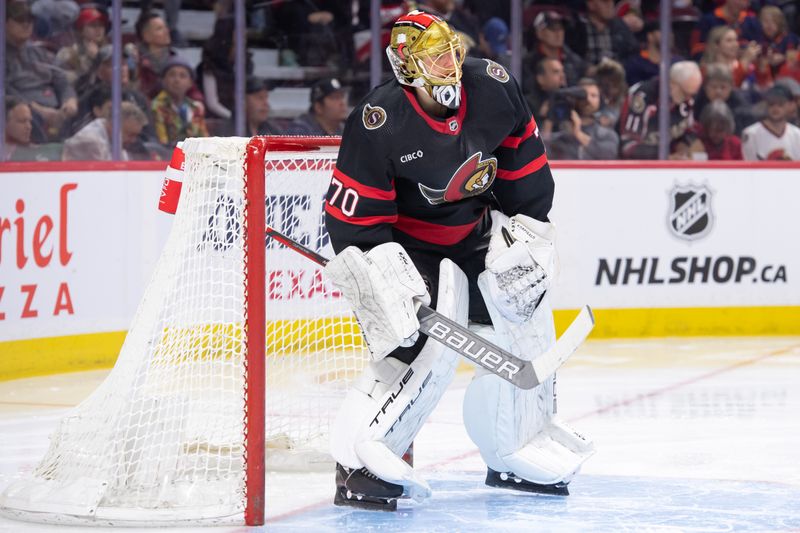 Mar 24, 2024; Ottawa, Ontario, CAN; Ottawa Senators goalie Joonas Korpisalo (70) looks up the ice in the second period against the Edmonton Oilers at the Canadian Tire Centre. Mandatory Credit: Marc DesRosiers-USA TODAY Sports