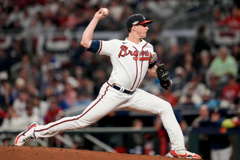 Oct 12, 2022; Atlanta, Georgia, USA; Atlanta Braves starting pitcher Kyle Wright (30) throws against the Philadelphia Phillies in the third inning during game two of the NLDS for the 2022 MLB Playoffs at Truist Park. Mandatory Credit: Dale Zanine-USA TODAY Sports