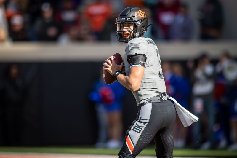 Nov 16, 2019; Stillwater, OK, USA; Oklahoma State Cowboys quarterback Spencer Sanders (3) looks to pass against the Kansas Jayhawks during the first quarter at Boone Pickens Stadium. Mandatory Credit: Rob Ferguson-USA TODAY Sports