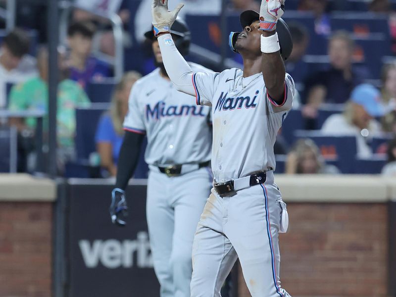 Jun 13, 2024; New York City, New York, USA; Miami Marlins center fielder Jazz Chisolm Jr. (2) celebrates his solo home run against the New York Mets during the seventh inning at Citi Field. Mandatory Credit: Brad Penner-USA TODAY Sports