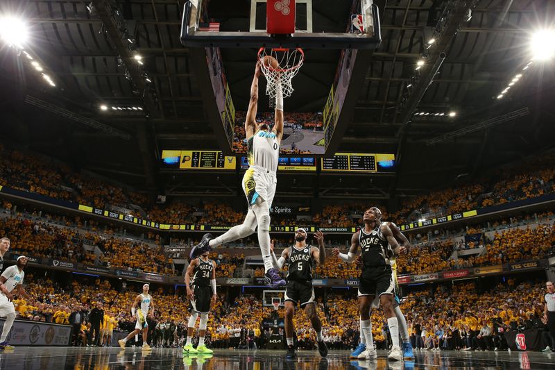 INDIANAPOLIS, IN - APRIL 29: Tyrese Haliburton #0 of the Indiana Pacers scores the game-tying basket during the game against the Milwaukee Bucks during Round 1 Game 5 of the 2025 NBA Playoffs on April 29, 2025 at Gainbridge Fieldhouse in Indianapolis, Indiana. NOTE TO USER: User expressly acknowledges and agrees that, by downloading and or using this Photograph, user is consenting to the terms and conditions of the Getty Images License Agreement. Mandatory Copyright Notice: Copyright 2025 NBAE(Photo by Joe Murphy/NBAE via Getty Images)