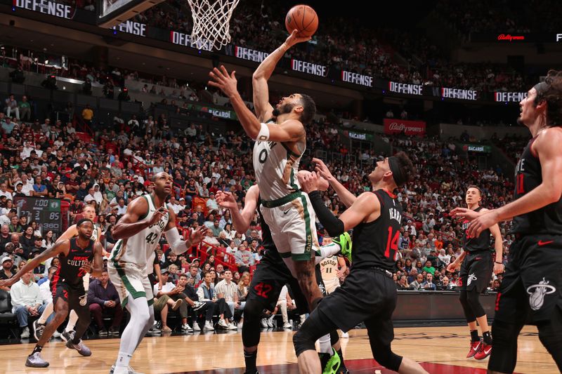 MIAMI, FL - FEBRUARY 11: Jayson Tatum #0 of the Boston Celtics shoots the ball during the game against the Miami Heat on February 11, 2024 at Kaseya Center in Miami, Florida. NOTE TO USER: User expressly acknowledges and agrees that, by downloading and or using this Photograph, user is consenting to the terms and conditions of the Getty Images License Agreement. Mandatory Copyright Notice: Copyright 2024 NBAE (Photo by Issac Baldizon/NBAE via Getty Images)