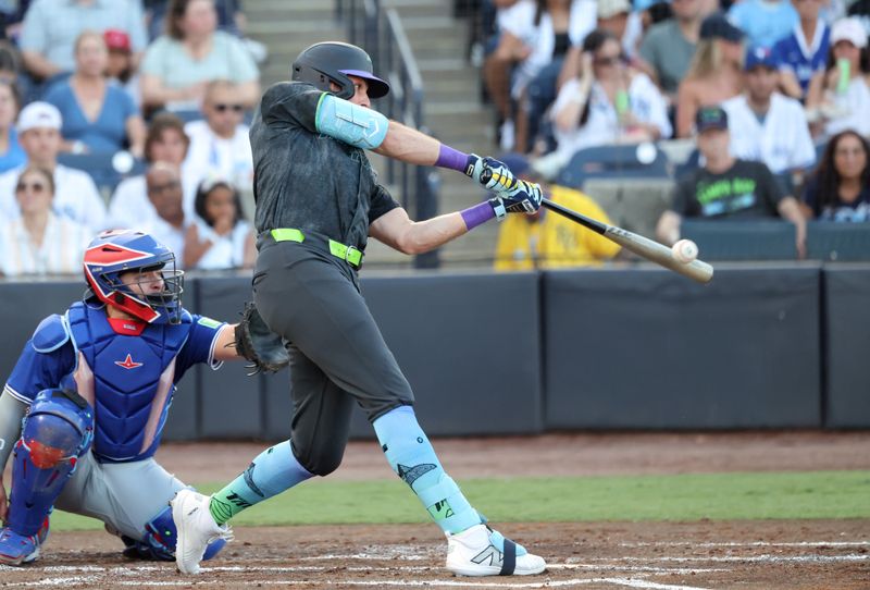 May 23, 2025; St. Petersburg, Florida, USA;  Tampa Bay Rays outfielder Josh Lowe (15) doubles against the Toronto Blue Jays during the second inning at George M. Steinbrenner Field. Mandatory Credit: Kim Klement Neitzel-Imagn Images
