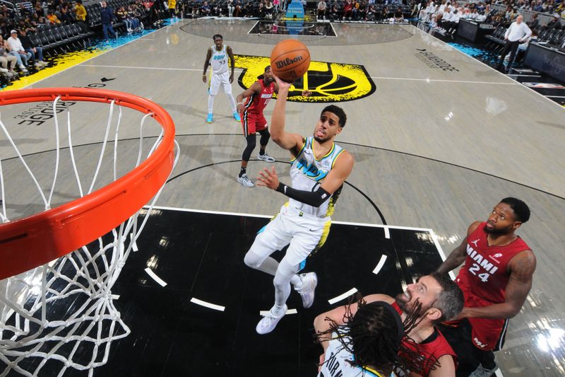 INDIANAPOLIS, IN - NOVEMBER 17: Tyrese Haliburton #0 of the Indiana Pacers drives to the basket during the game against the Miami Heat on November 17, 2024 at Gainbridge Fieldhouse in Indianapolis, Indiana. NOTE TO USER: User expressly acknowledges and agrees that, by downloading and or using this Photograph, user is consenting to the terms and conditions of the Getty Images License Agreement. Mandatory Copyright Notice: Copyright 2024 NBAE (Photo by Ron Hoskins/NBAE via Getty Images)