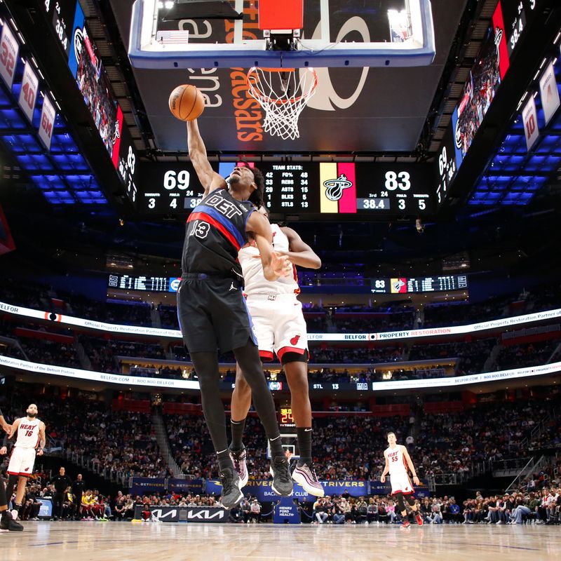 DETROIT, MI - MARCH 15: James Wiseman #13 of the Detroit Pistons grabs a rebound during the game against the Miami Heat on March 15, 2024 at Little Caesars Arena in Detroit, Michigan. NOTE TO USER: User expressly acknowledges and agrees that, by downloading and/or using this photograph, User is consenting to the terms and conditions of the Getty Images License Agreement. Mandatory Copyright Notice: Copyright 2024 NBAE (Photo by Brian Sevald/NBAE via Getty Images)