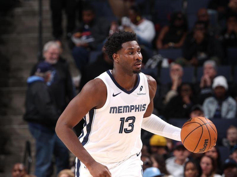 MEMPHIS, TN - DECEMBER 5: Jaren Jackson Jr. #13 of the Memphis Grizzlies dribbles the ball during the game against the Sacramento Kings on December 5, 2024 at FedExForum in Memphis, Tennessee. NOTE TO USER: User expressly acknowledges and agrees that, by downloading and or using this photograph, User is consenting to the terms and conditions of the Getty Images License Agreement. Mandatory Copyright Notice: Copyright 2024 NBAE (Photo by Joe Murphy/NBAE via Getty Images)