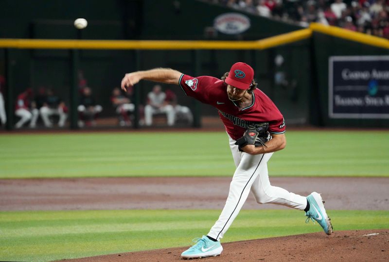 Jul 14, 2024; Phoenix, Arizona, USA; Arizona Diamondbacks pitcher Zac Gallen (23) pitches against the Toronto Blue Jays during the first inning at Chase Field. Mandatory Credit: Joe Camporeale-USA TODAY Sports