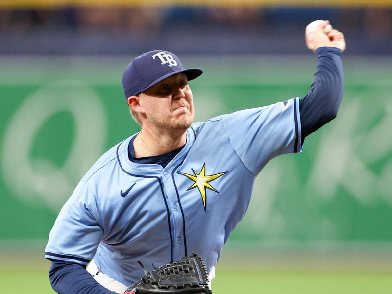 Apr 18, 2024; St. Petersburg, Florida, USA;  Tampa Bay Rays pitcher Garrett Cleavinger (60) throws a pitch against the Los Angeles Angels in the seventh inning at Tropicana Field. Mandatory Credit: Nathan Ray Seebeck-USA TODAY Sports