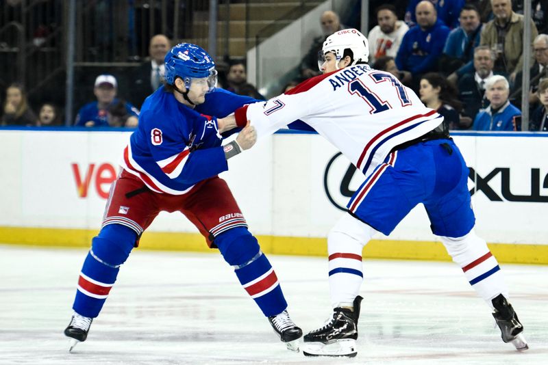 Nov 30, 2024; New York, New York, USA; New York Rangers defenseman Jacob Trouba (8) and Montreal Canadiens right wing Josh Anderson (17) fight during the first period at Madison Square Garden. Mandatory Credit: John Jones-Imagn Images