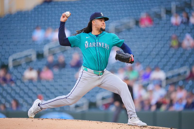 May 6, 2024; Minneapolis, Minnesota, USA; Seattle Mariners pitcher Luis Castillo (58) pitches against the Minnesota Twins in the first inning at Target Field. Mandatory Credit: Brad Rempel-USA TODAY Sports