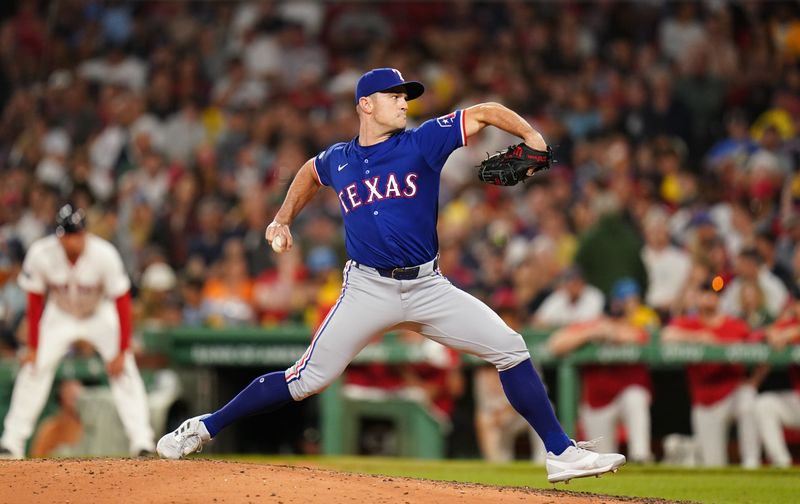 Aug 12, 2024; Boston, Massachusetts, USA; Texas Rangers relief pitcher David Robertson (37) throws a pitch against the Boston Red Sox in the seventh inning at Fenway Park. Mandatory Credit: David Butler II-USA TODAY Sports