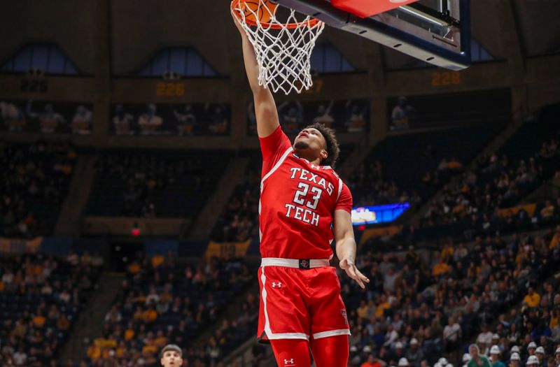 Mar 2, 2024; Morgantown, West Virginia, USA; Texas Tech Red Raiders forward Eemeli Yalaho (23) shoots in the lane during the first half against the West Virginia Mountaineers at WVU Coliseum. Mandatory Credit: Ben Queen-USA TODAY Sports