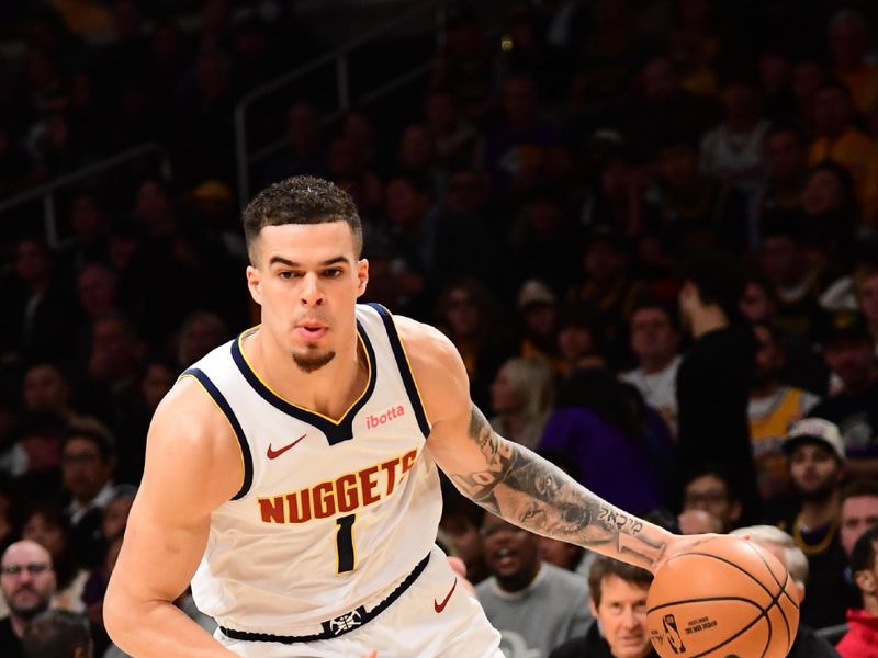 LOS ANGELES, CA - FEBRUARY 8: Michael Porter Jr. #1 of the Denver Nuggets dribbles the ball during the game against the Los Angeles Lakers on February 8, 2024 at Crypto.Com Arena in Los Angeles, California. NOTE TO USER: User expressly acknowledges and agrees that, by downloading and/or using this Photograph, user is consenting to the terms and conditions of the Getty Images License Agreement. Mandatory Copyright Notice: Copyright 2024 NBAE (Photo by Adam Pantozzi/NBAE via Getty Images)