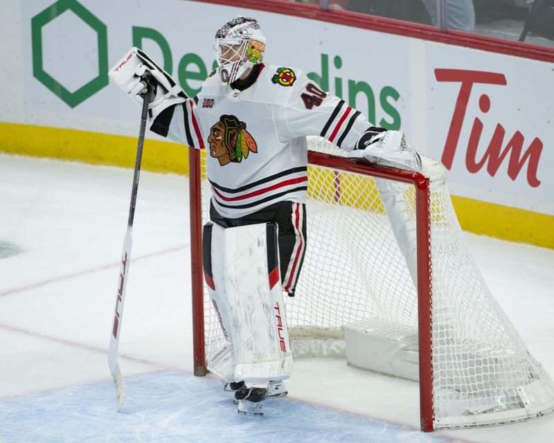 Dec 20, 2025; Ottawa, Ontario, CAN; Chicago Blackhawks goalie Arvid Soderblom (40) looks up the ice during a break in action in the third period against the Ottawa Senators at the Canadian Tire Centre. Mandatory Credit: Marc DesRosiers-IMAGN Images