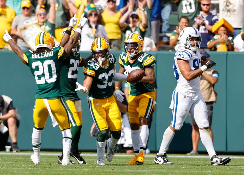 Green Bay Packers safety Evan Williams (33) intercepts the ball on the final play during a NFL football game against the Indianapolis Colts Sunday, Sept. 15, 2024, in Green Bay, Wis. (AP Photo/Jeffrey Phelps