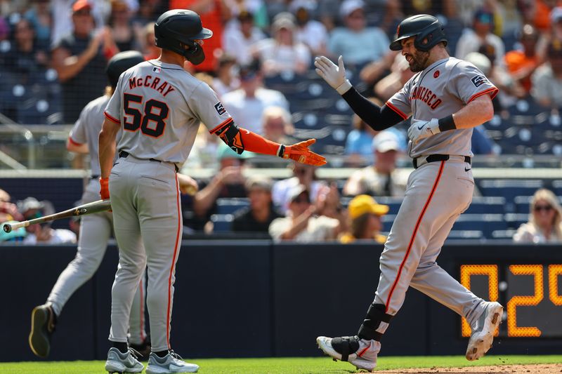 Sep 8, 2024; San Diego, California, USA; San Francisco Giants catcher Curt Casali (2) high fives center fielder Grant McCray (58) after hitting a solo home run during the sixth inning against the San Diego Padres at Petco Park. Mandatory Credit: Chadd Cady-Imagn Images