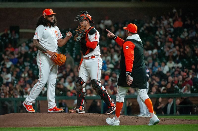 Sep 12, 2023; San Francisco, California, USA; San Francisco Giants manager Gabe Kapler (19) calls to the bullpen while removing starting pitcher Sean Manaea (52) from the game during the sixth inning at Oracle Park. Mandatory Credit: Ed Szczepanski-USA TODAY Sports