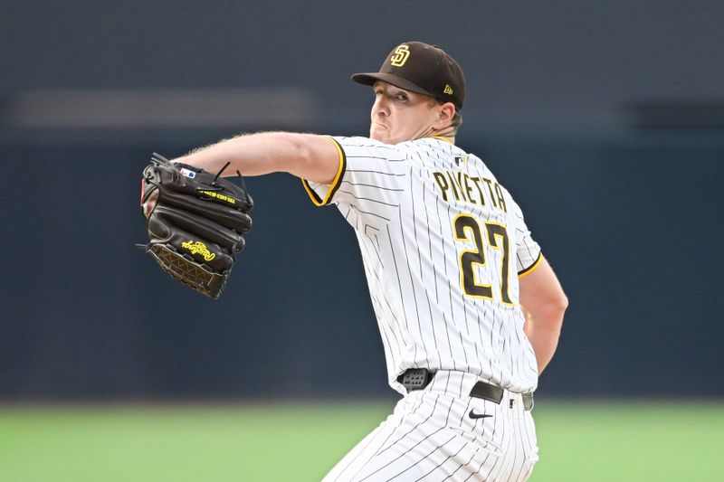 Sep 10, 2025; San Diego, California, USA; San Diego Padres starting pitcher Nick Pivetta (27) delivers during the first inning against the Cincinnati Reds at Petco Park. Mandatory Credit: Denis Poroy-Imagn Images