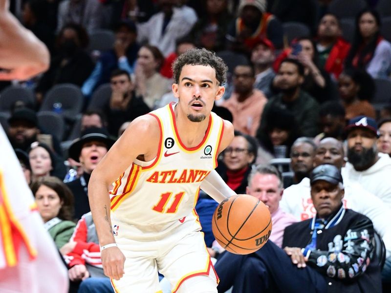 ATLANTA, GA - FEBUARY 9: Trae Young #11 of the Atlanta Hawks goes to the basket during the game  on Febuary 9, 2023 at State Farm Arena in Atlanta, Georgia.  NOTE TO USER: User expressly acknowledges and agrees that, by downloading and/or using this Photograph, user is consenting to the terms and conditions of the Getty Images License Agreement. Mandatory Copyright Notice: Copyright 2023 NBAE (Photo by Adam Hagy/NBAE via Getty Images)