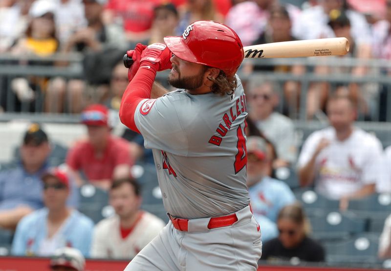 Jul 4, 2024; Pittsburgh, Pennsylvania, USA; St. Louis Cardinals right fielder Alec Burleson (41) hits a single against the Pittsburgh Pirates during the sixth inning at PNC Park. Mandatory Credit: Charles LeClaire-USA TODAY Sports