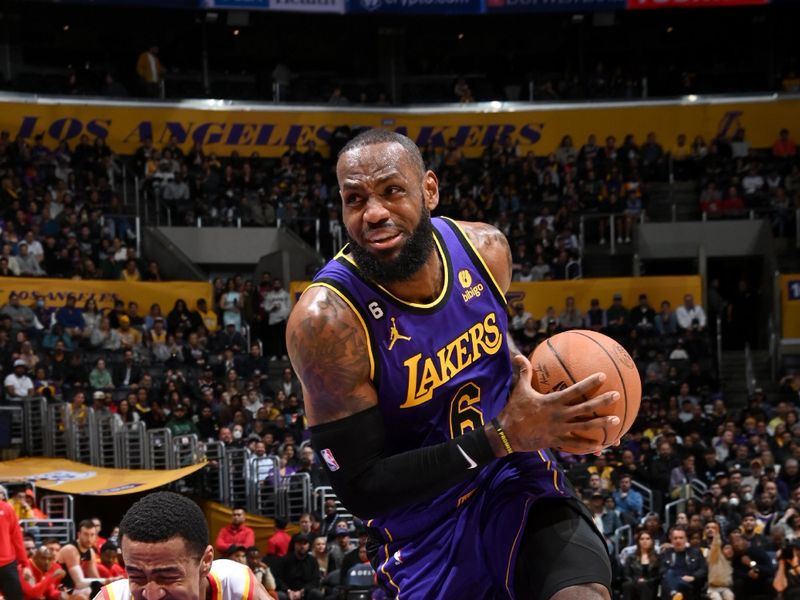 LOS ANGELES, CA - JANUARY 6: LeBron James #6 of the Los Angeles Lakers drives to the basket during the game against the Atlanta Hawks on January 6, 2023 at Crypto.Com Arena in Los Angeles, California. NOTE TO USER: User expressly acknowledges and agrees that, by downloading and/or using this Photograph, user is consenting to the terms and conditions of the Getty Images License Agreement. Mandatory Copyright Notice: Copyright 2023 NBAE (Photo by Andrew D. Bernstein/NBAE via Getty Images)