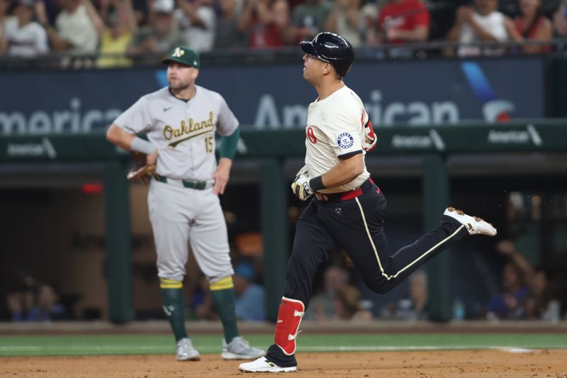 Aug 30, 2024; Arlington, Texas, USA; Texas Rangers first base Nathaniel Lowe (30) rounds the bases after hitting a solo home run in the second inning against the Oakland Athletics at Globe Life Field. Mandatory Credit: Tim Heitman-USA TODAY Sports