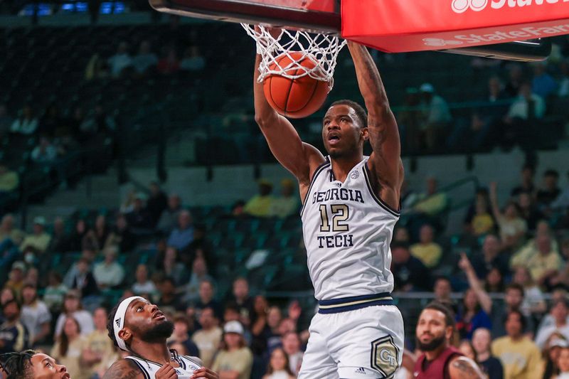 Dec 9, 2023; Atlanta, Georgia, USA; Georgia Tech Yellow Jackets forward Tyzhaun Claude (12) dunks against the Alabama A&M Bulldogs in the first half at McCamish Pavilion. Mandatory Credit: Brett Davis-USA TODAY Sports