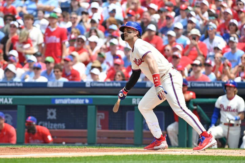 Jun 11, 2023; Philadelphia, Pennsylvania, USA; Philadelphia Phillies designated hitter Bryce Harper (3) hits an RBI single during the first inning against the Los Angeles Dodgers at Citizens Bank Park. Mandatory Credit: Eric Hartline-USA TODAY Sports
