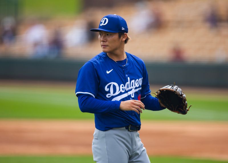 Mar 6, 2024; Phoenix, Arizona, USA; Los Angeles Dodgers pitcher Yoshinobu Yamamoto against the Chicago White Sox during a spring training baseball game at Camelback Ranch-Glendale. Mandatory Credit: Mark J. Rebilas-USA TODAY Sports