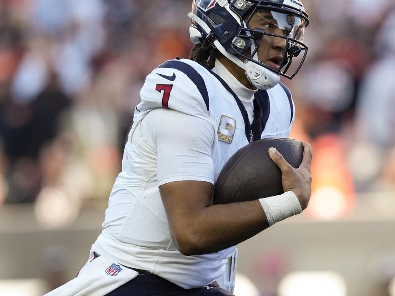 Houston Texans quarterback C.J. Stroud runs for a touchdown during the second half of an NFL against the Cincinnati Bengals football game, Sunday, Nov. 12, 2023, in Cincinnati. (AP Photo/Carolyn Kaster)