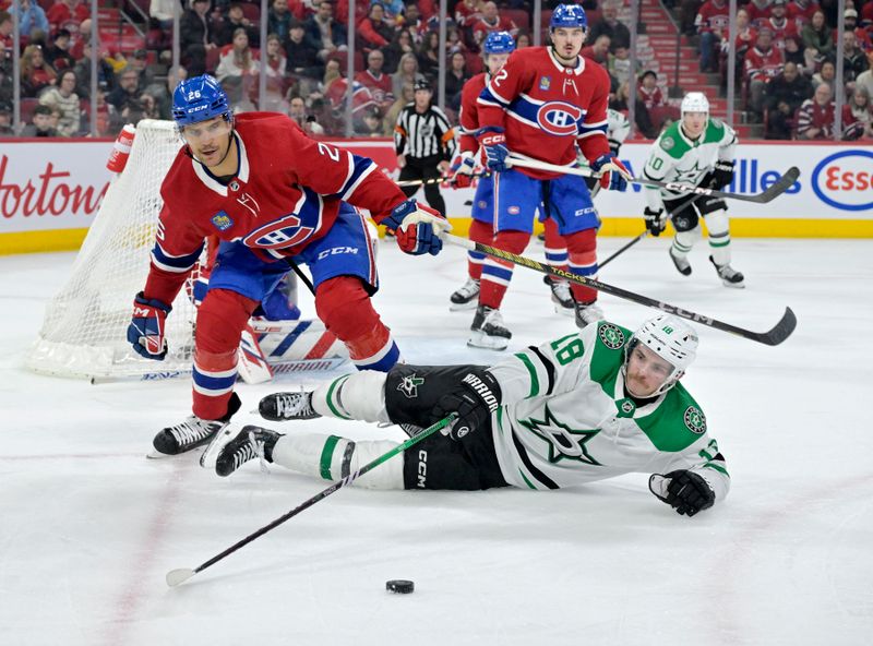 Feb 10, 2024; Montreal, Quebec, CAN; Dallas Stars forward Sam Steel (18) controls the puck against Montreal Canadiens defenseman Johnathan Kovacevic (26) during the third period at the Bell Centre. Mandatory Credit: Eric Bolte-USA TODAY Sports