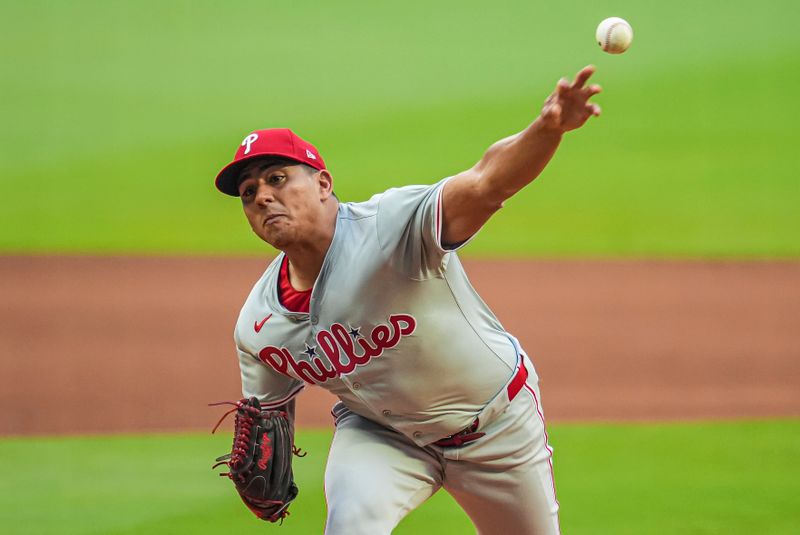 Jul 6, 2024; Cumberland, Georgia, USA; Philadelphia Phillies pitcher Ranger Suarez (55) pitches against the Atlanta Braves during the first inning at Truist Park. Mandatory Credit: Dale Zanine-USA TODAY Sports