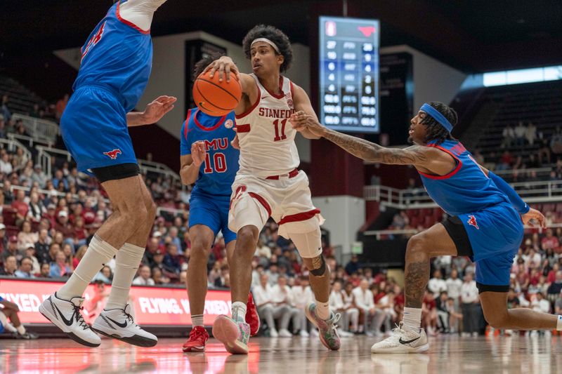 Mar 1, 2025; Stanford, California, USA;  Stanford Cardinal guard Ryan Agarwal (11) controls the ball during the first half against Southern Methodist Mustangs center Samet Yigitoglu (24), guard AJ George (10) and guard B.J. Edwards (0) at Maples Pavilion. Mandatory Credit: Stan Szeto-Imagn Images