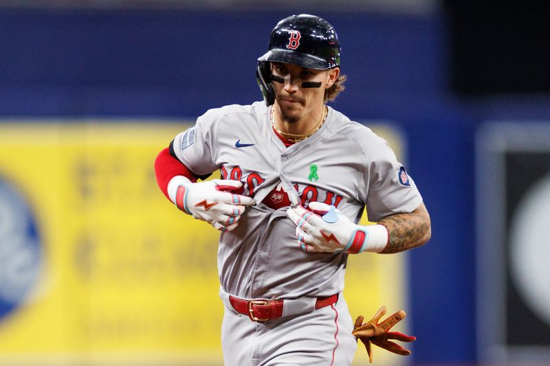 May 21, 2024; St. Petersburg, Florida, USA;  Boston Red Sox outfielder Jarren Duran (16) runs the bases after hitting a home run against the Tampa Bay Rays in the sixth inning at Tropicana Field. Mandatory Credit: Nathan Ray Seebeck-USA TODAY Sports