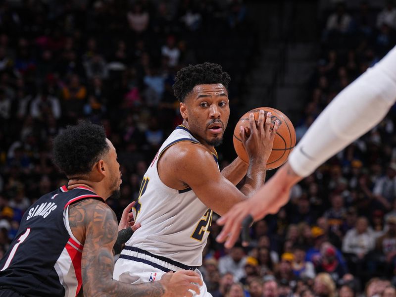 DENVER, CO - FEBRUARY 10: Jalen Pickett #24 of the Denver Nuggets looks to pass the ball during the game against the Portland Trail Blazers on February 10, 2025 at Ball Arena in Denver, Colorado. NOTE TO USER: User expressly acknowledges and agrees that, by downloading and/or using this Photograph, user is consenting to the terms and conditions of the Getty Images License Agreement. Mandatory Copyright Notice: Copyright 2025 NBAE (Photo by Garrett Ellwood/NBAE via Getty Images)