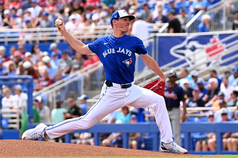 Mar 2, 2024; Dunedin, Florida, USA; Toronto Blue Jays pitcher Chris Bassit (40) throws a pitch in the first inning of the spring training  game against the Atlanta Braves at TD Ballpark. Mandatory Credit: Jonathan Dyer-USA TODAY Sports