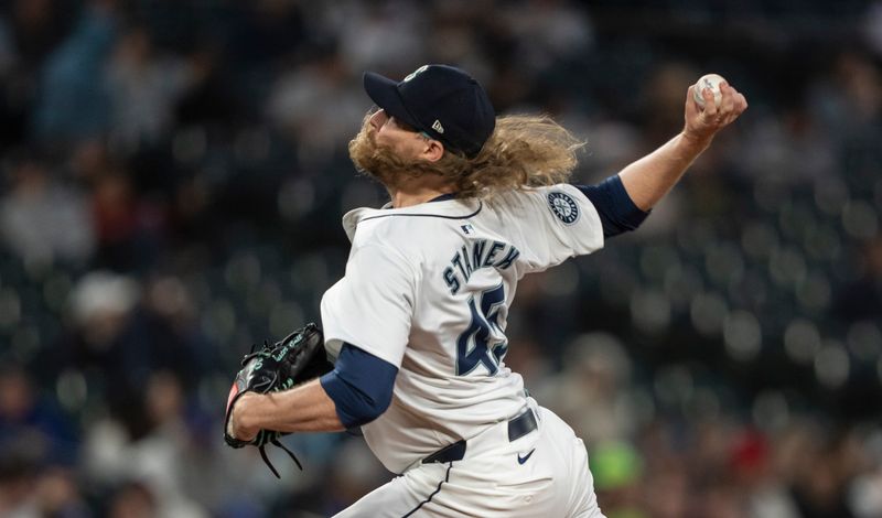 May 13, 2024; Seattle, Washington, USA; Seattle Mariners reliever Ryne Stanek (45) delivers a pitch during the eighth inning against the Kansas City Royals at T-Mobile Park. Mandatory Credit: Stephen Brashear-USA TODAY Sports