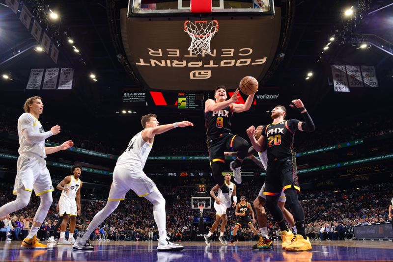 PHOENIX, AZ - FEBRUARY 8: Grayson Allen #8 of the Phoenix Suns drives to the basket during the game against the Utah Jazz on February 8, 2024 at Footprint Center in Phoenix, Arizona. NOTE TO USER: User expressly acknowledges and agrees that, by downloading and or using this photograph, user is consenting to the terms and conditions of the Getty Images License Agreement. Mandatory Copyright Notice: Copyright 2024 NBAE (Photo by Barry Gossage/NBAE via Getty Images)
