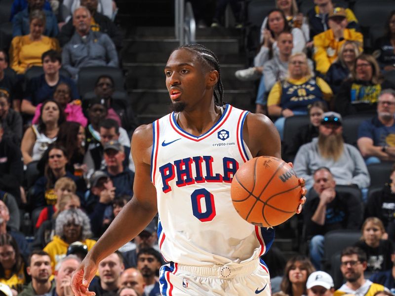 INDIANAPOLIS, IN - OCTOBER 27: Tyrese Maxey #0 of the Philadelphia 76ers brings the ball up court during the game against the Indiana Pacers on October 27, 2024 at Gainbridge Fieldhouse in Indianapolis, Indiana. NOTE TO USER: User expressly acknowledges and agrees that, by downloading and or using this Photograph, user is consenting to the terms and conditions of the Getty Images License Agreement. Mandatory Copyright Notice: Copyright 2024 NBAE (Photo by Ron Hoskins/NBAE via Getty Images)
