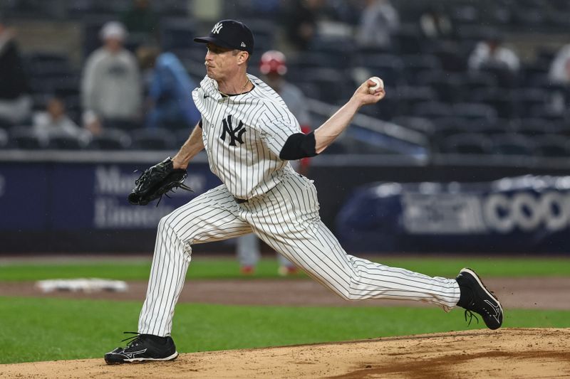 Aug 8, 2024; Bronx, New York, USA;  New York Yankees pitcher Tim Hill (54) pitches in the eighth inning against the Los Angeles Angels at Yankee Stadium. Mandatory Credit: Wendell Cruz-USA TODAY Sports