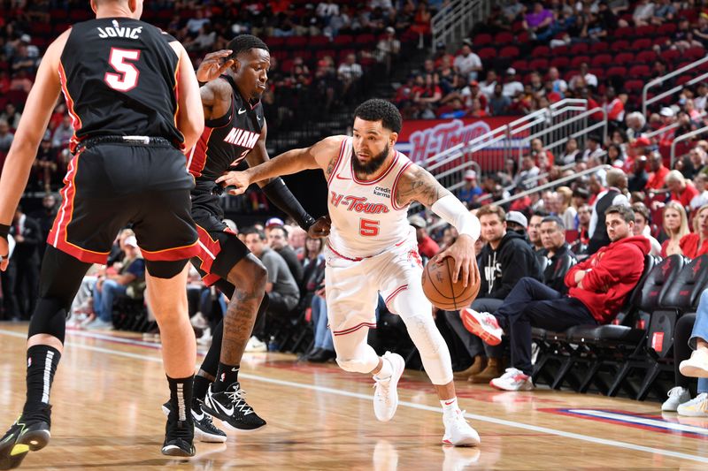 HOUSTON, TX - APRIL 5: Fred VanVleet #5 of the Houston Rockets dribbles the ball during the game against the Miami Heat on April 5, 2024 at the Toyota Center in Houston, Texas. NOTE TO USER: User expressly acknowledges and agrees that, by downloading and or using this photograph, User is consenting to the terms and conditions of the Getty Images License Agreement. Mandatory Copyright Notice: Copyright 2024 NBAE (Photo by Logan Riely/NBAE via Getty Images)