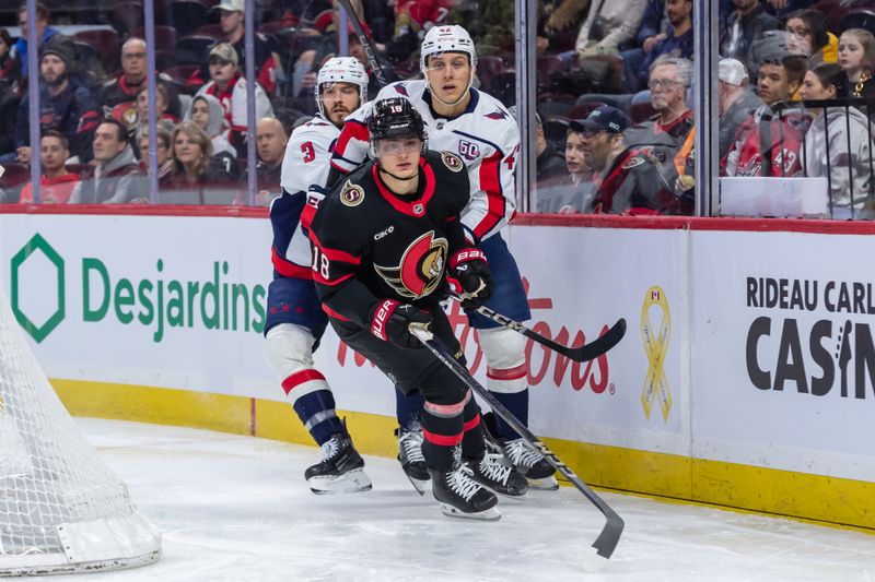 Jan 30, 2025; Ottawa, Ontario, CAN; Ottawa Senators center Tim Stutzle (18) skates in front of Washington Capitals defensemen Martin Fehervary (42) and Matt Roy (3) in the first period at the Canadian Tire Centre. Mandatory Credit: Marc DesRosiers-Imagn Images