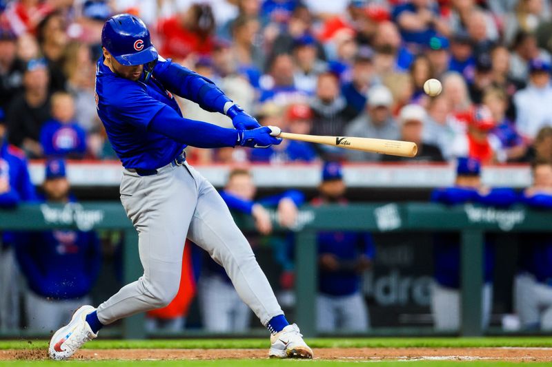 May 23, 2025; Cincinnati, Ohio, USA; Chicago Cubs second baseman Nico Hoerner (2) hits a double in the third inning against the Cincinnati Reds at Great American Ball Park. Mandatory Credit: Katie Stratman-Imagn Images