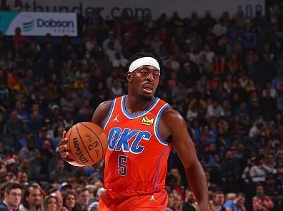 OKLAHOMA CITY, OK - DECEMBER 23: Luguentz Dort #5 of the Oklahoma City Thunder looks on during the game against the Los Angeles Lakers on December 23, 2023 at Paycom Arena in Oklahoma City, Oklahoma. NOTE TO USER: User expressly acknowledges and agrees that, by downloading and or using this photograph, User is consenting to the terms and conditions of the Getty Images License Agreement. Mandatory Copyright Notice: Copyright 2023 NBAE (Photo by Zach Beeker/NBAE via Getty Images)